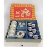 Boxed child’s unmarked 15 piece tea service
