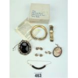 Dress jewellery including Metropolitan Museum of Art snake bracelet, cameo brooch, dress brooch,