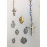 6 sets of rosary beads and assorted religious charms