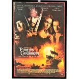 Framed film poster ‘Pirates of the Caribbean, The Curse of the Black Pearl’, signed by Johnny Depp