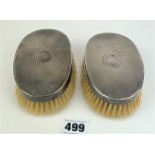 Pair of silver backed gents hairbrushes