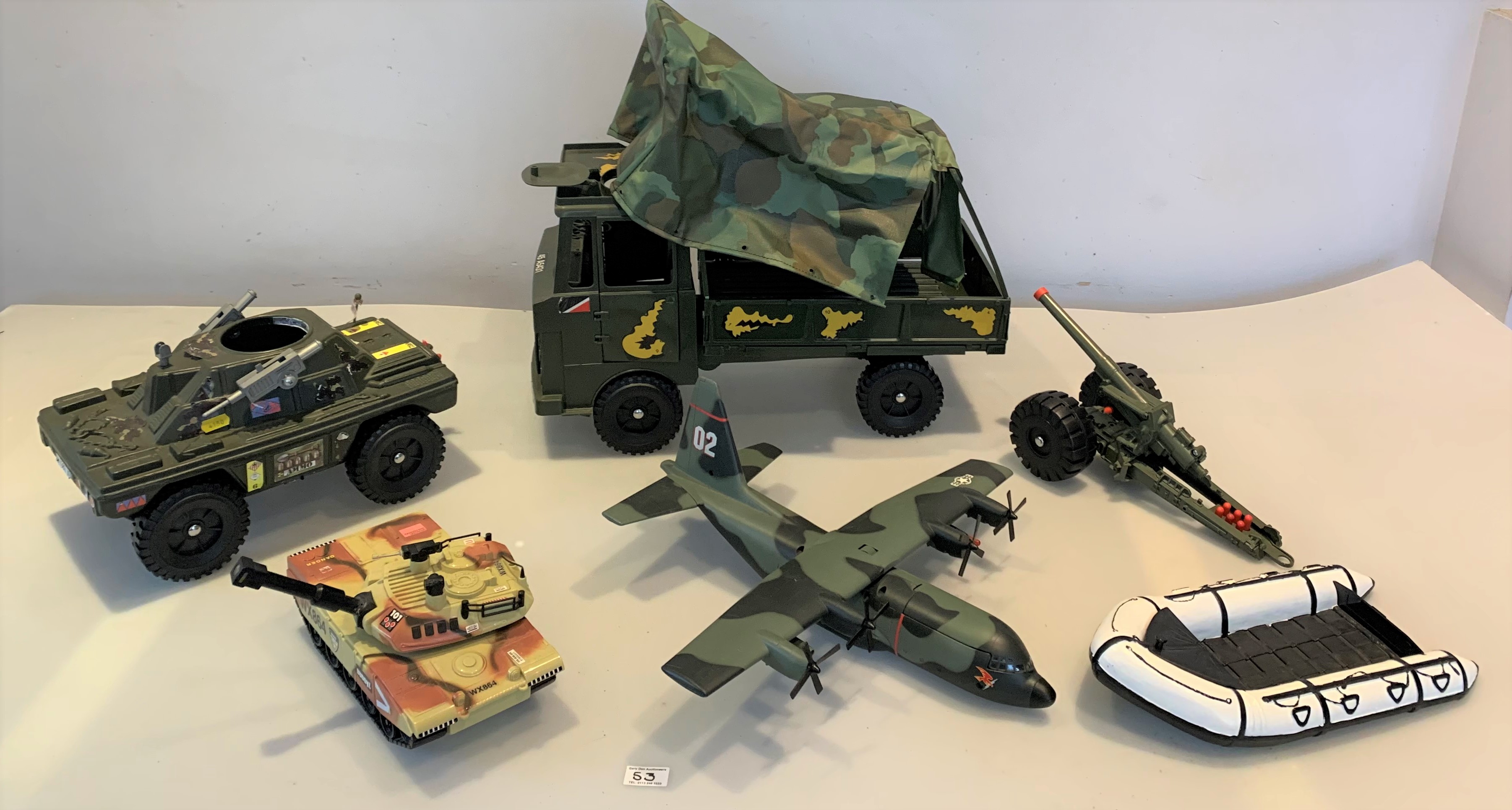 Action Man army truck, armoured vehicle, military plane, artillery gun, rubber dinghy and Buddy L