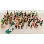 Box of assorted miniature bottles of alcohol
