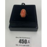 18k Egyptian gold ring with coral coloured stone, size O, w: 6.2 gms