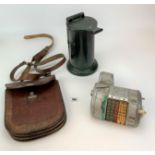 Bus conductor’s leather pouch, Almex ticket machine and cylinder shaped ticket machine