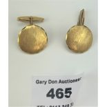 Pair of 18k gold cufflinks, 0.75” diameter, w: 11.5 gms