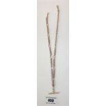 9k gold watch chain with t-bar, 19” long, w: 13.9 gms