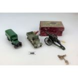 2 loose Dinky military trucks and boxed Britains artillery gun