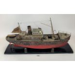 Wood and metal model steam boat on plinth with boiler and engine, 26” long x 14”high