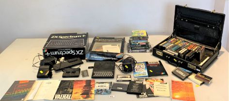 Sinclair ZX Spectrum personal computer with games & accessories and case of computer games on