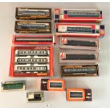 13 boxed carriages and wagons inc. Mainline, Lima, Hornby, Wrenn and Jouef