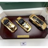 Boxed Jaguar Classics Cars set – 3 gold plated cars on plinth