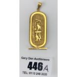 18k gold pendant with Egyptian cartouche design, 2” long, w: 10 gms