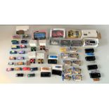 40+ assorted boxed and loose vehicles inc. Burago, Corgi, Dinky, Auto-City etc.