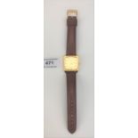 Gold plated Girard-Perregaux gents watch with leather strap. Working