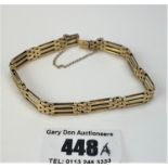 14k gold gate bracelet 7”long, w: 14.7 gms