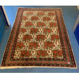 Red/green flower design rug, 81” x 57”