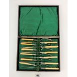 Cased set of 6 bone handled and plated fish knives and forks
