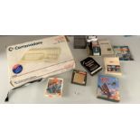 Boxed Amiga Commodore Model 500 computer with assorted games and instruction books