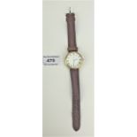 18k gold Concord gents watch , total w: including leather strap 38.2 gms. Working