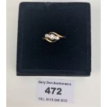 9k gold and platinum ring with 3 diamonds,