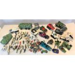 Quantity of loose plastic spaceships, military vehicles and figures