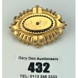 10k cased gold mourning brooch with diamond and glass back, 2” long, w: 13 gms