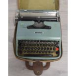 Olivetti Lettera 22 portable typewriter, with canvas cover