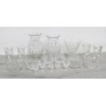 Collection of cut glass and moulded glasswares, including three vases, four similar jugs and a
