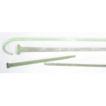 Long twist decorated green glass Nailsea walking cane with knop finial, 48" long; together with a