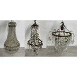 Two similar prismatic crystal drop tiered chandelier; together with a pendant crystal chandelier (3)