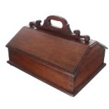 Victorian mahogany cutlery box, with scroll carved handle over twin hinged covers, raised on shallow