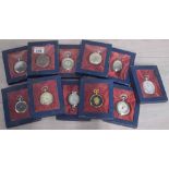 Collection of eleven quartz pocket watches, all boxed (11)