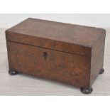 19th century burr walnut tea caddy, the hinged cover enclosing a divided interior with removable