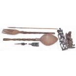 Novelty large carved fork and spoon, both 40" approx; together with an African carved wooden