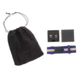 Pair of Tudor cufflinks, boxed; together with a large Tudor strap, with Tudor pouch (2)