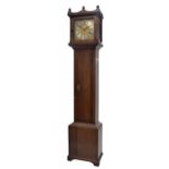 Oak thirty hour longcase clock with birdcage movement, the 11" square brass dial signed Simon Cross,
