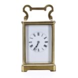 French carriage clock striking on a gong, within a corniche brass case, 7.25" high, (key), (later