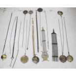 Eleven longcase clock pendulums and rods; also some spare pendulum rods, eight longcase clock seat