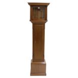 Contemporary mahogany case with aperture for an 11.5" square dial, the case with long door and the