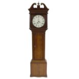 Oak and mahogany crossbanded thirty hour longcase clock, the 12" circular painted dial signed