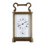 Carriage clock timepiece with alarm striking on a bell, within a corniche brass case, 7.5" high