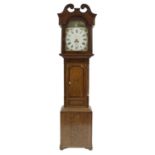Oak and mahogany thirty hour longcase clock, the 12" painted arched dial indistinctly signed and