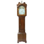 Oak eight day longcase clock, the 14" painted arched dial signed William Foster, Manchester to the