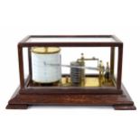 Old barograph, within an oak glazed case upon a stepped plinth, 14.75" wide