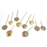 Ten medium size mantel and wall clock pendulums (10)