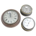 Gillett & Johnston electric 8" slave dial wall clock within a turned surround; also a 6" bulkhead