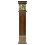 Oak eight day longcase clock with five pillar movement, the 12" square brass dial signed J.