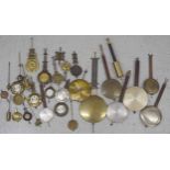 Quantity of various larger and decorative clock pendulums