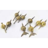 Eight various brass ball and spike clock finials; also two brass ball and eagle clock finials (10)